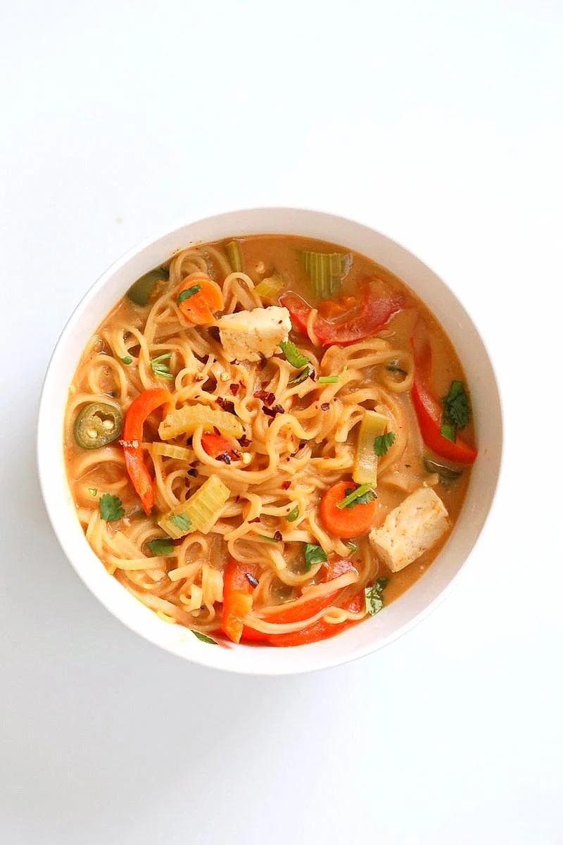 One Pot Peanut Sauce Noodles, Ready in 20 minutes! Brown Rice Noodles, Veggies, Peanut or Almond Butter, spices, flavors, boil and done. Easy Quick Weeknight Dinner Recipe | VeganRicha.com