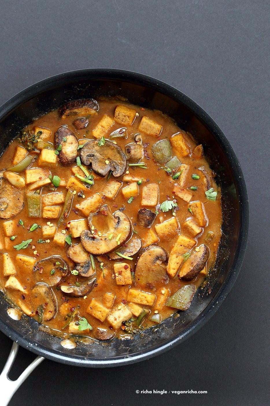 Hoisin Tofu Mushroom Stir Fry with homemade Hoisin Sauce. Easy Weeknight Meal with crisped Tofu, golden mushrooms, broccoli, peppers in from scratch Hoisin sauce. Serve over cooked grains. Vegan Gluten-free Recipe. | VeganRicha.com