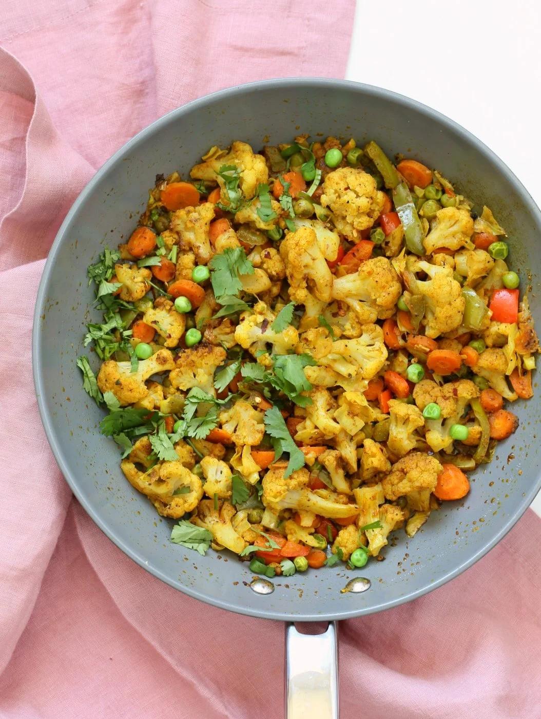8 Spice Veggie Stir fry - Vegetable Masala Subzi. Use up the veggies to make this dry Veggie Stir fry with Indian Spices. Serve with Dal or Curries. Vegan Gluten-free Soy-free Nut-free Recipe | VeganRicha.com