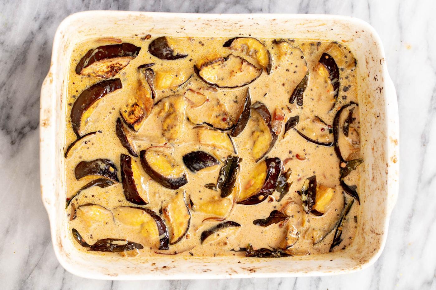 eggplant slices baking in coconut milk