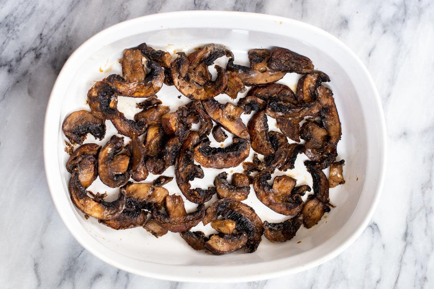 baked mushroom slices in a casserole dish