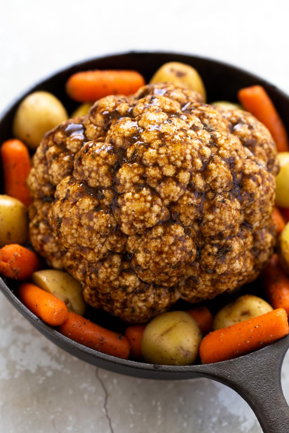 Whole Roasted Cauliflower. This Baked Whole Roasted Cauliflower is marinated in flavorful of herbs and spices and baked to perfection to make a fabulous Holiday table option. #VeganRicha #holiday #Vegan #Glutenfree #Nutfree #recipe. Can be #soyfree