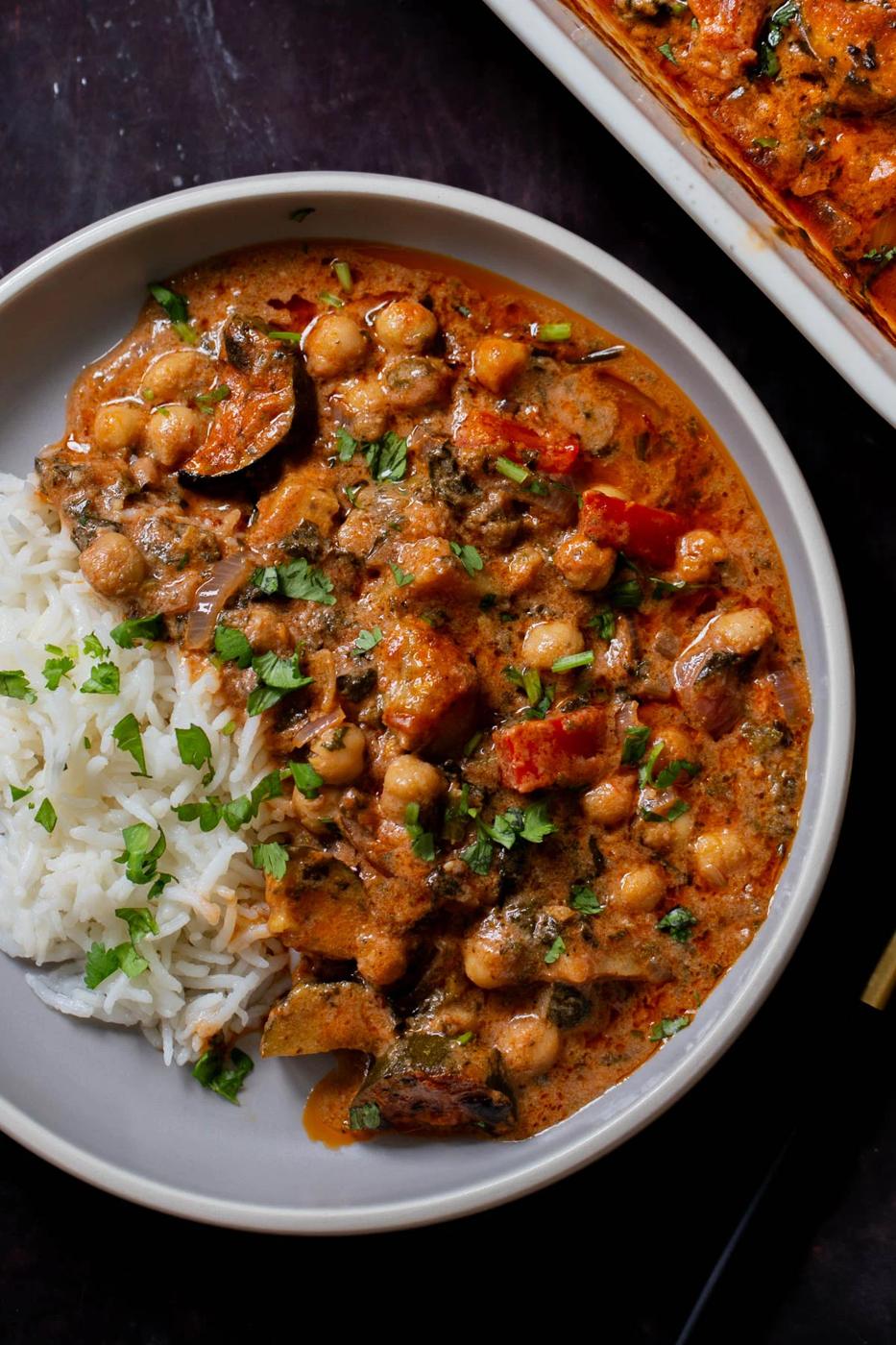 chickpea zucchini curry in a bowl with rice