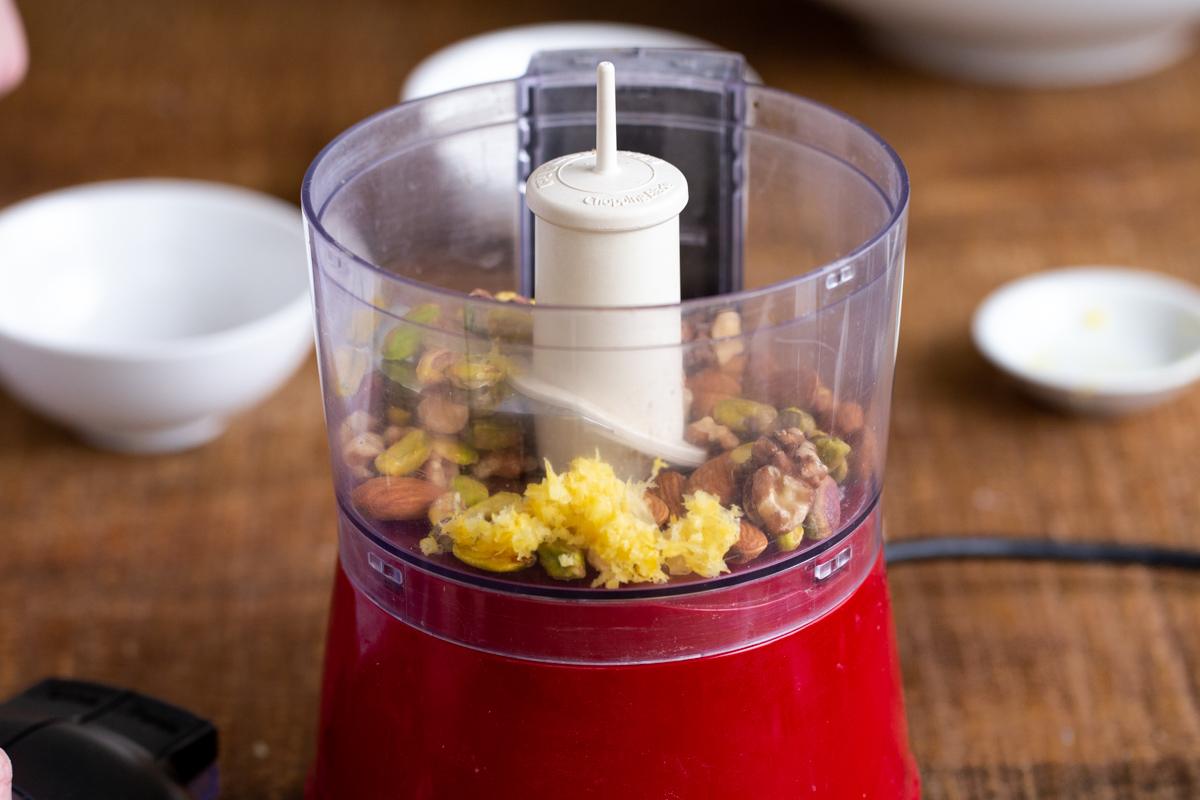 pistachios and lemon zest in a small food processor