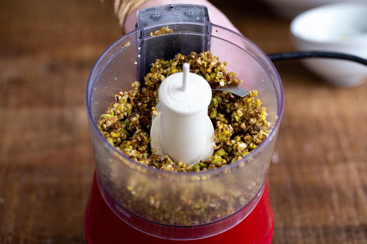 chopped nuts, dates and lemon zest in a small food processor