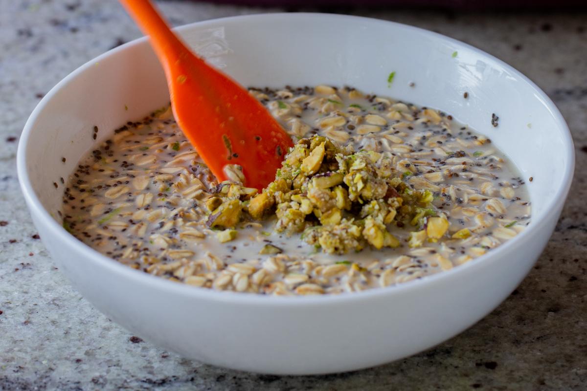 stirring some of the baklava nut mixture into the oat mixture