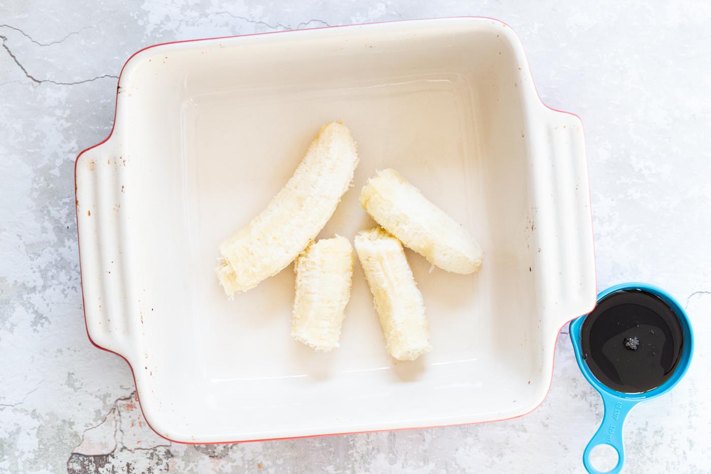 Bananas for Our Vegan Banana Bread Baked Oatmeal in a white baking dish