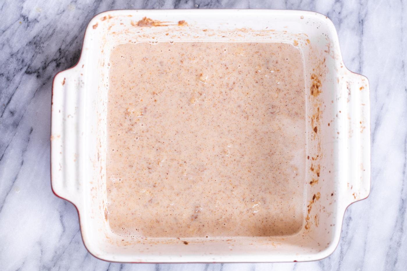 batter for banana oatmeal bars in a casserole dish