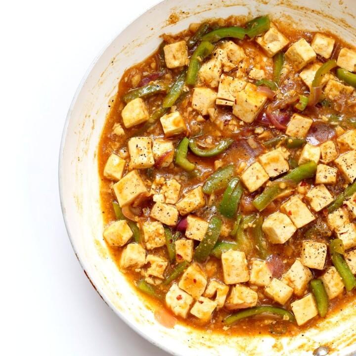 Chilli Tofu - Indian Chilli "Paneer" Recipe. Chilli Paneer is an Indo-chinese fusion stir fry served with other fusion noodles or fried rice. Crisp Tofu replaces the Paneer cheese in this delicious and quick version. Vegan Gluten-free Nut-free Recipe | VeganRicha.com #vegan #glutenfree #veganricha