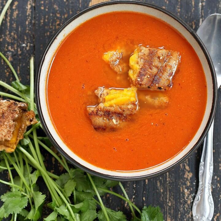 Indian Spiced Tomato Soup. Clear your sinuses tomato soup to warm you up in fall. Easy homemade vegan tomato soup seasoned with cumin, coriander and Turmeric. Vegan gluten-free Soy-free Recipe. | VeganRicha.com #glutenfree #veganricha #vegan