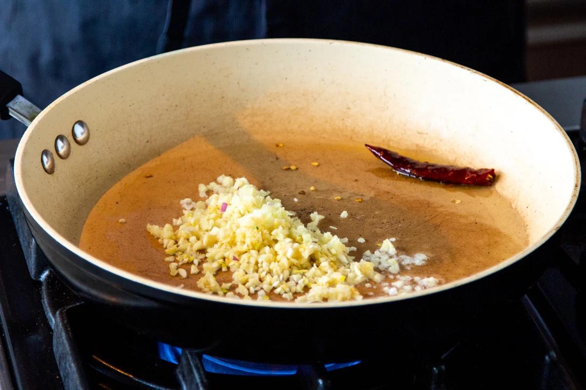 minced garlic and ginger in a pan