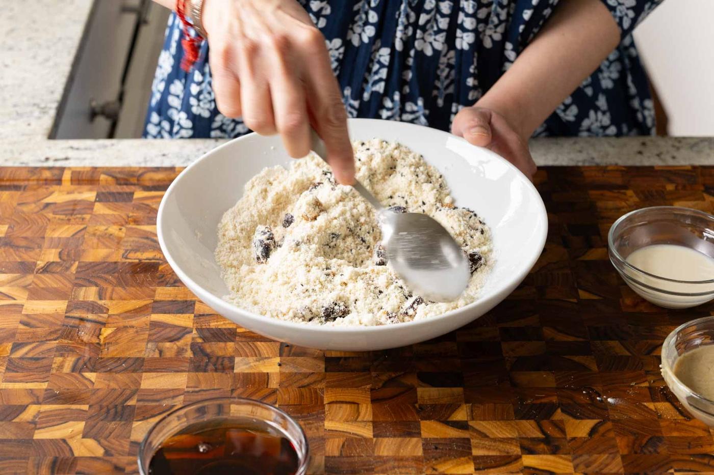 mixing in the black sesame seeds and dates