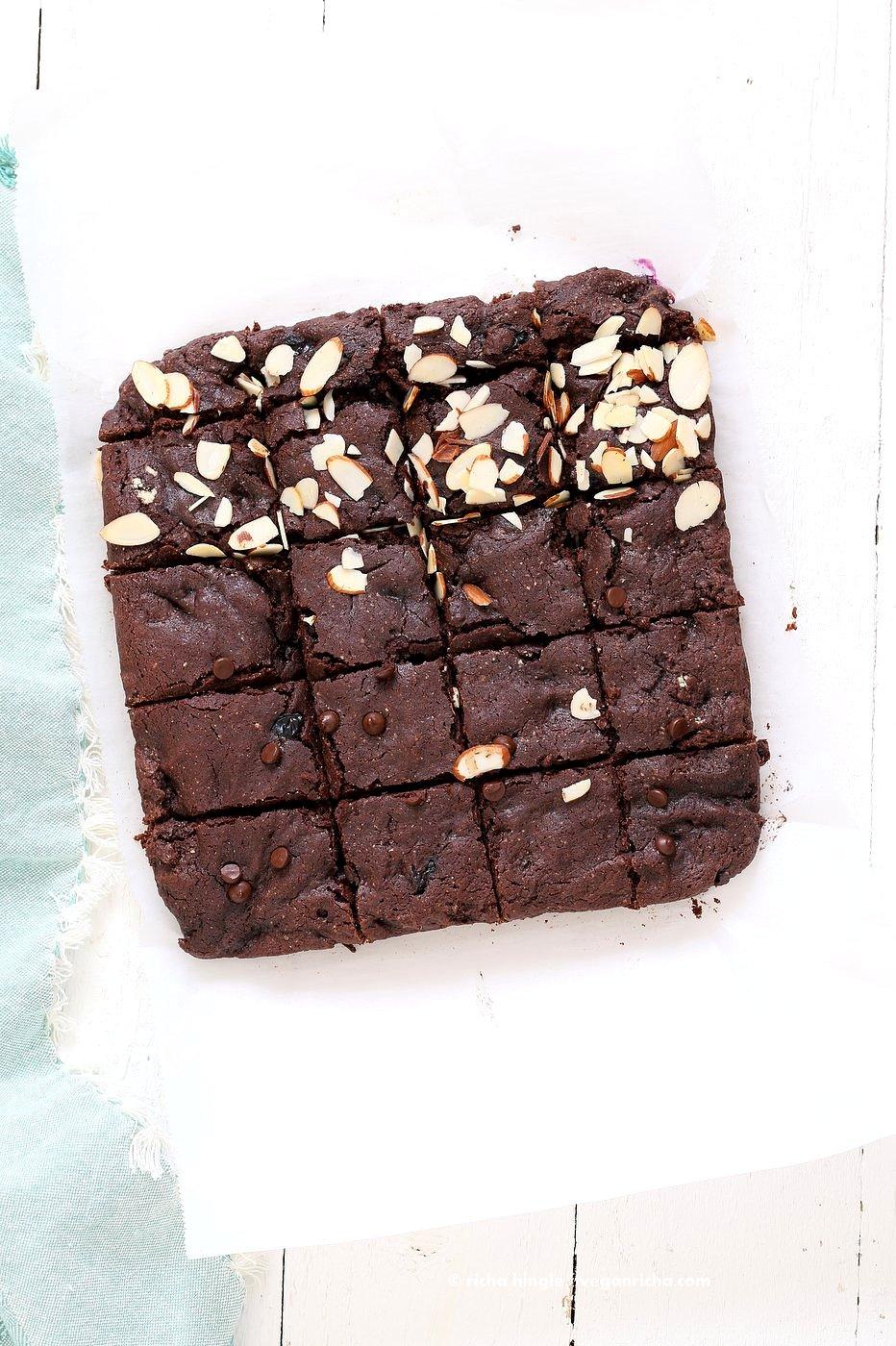 Double Blueberry Brownies. Summer Dark Chocolate Brownies with blueberries and almonds. Blueberries cooked to a compote in the wet and blueberries added with chocolate chips in the batter. Vegan Brownie Recipe. Easily made gluten-free | VeganRicha.com