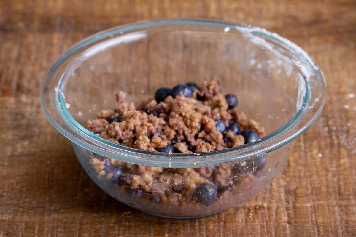 blueberry streusel dough in a glass bowl