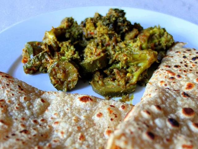 Broccoli and Zucchini in onion and pickle spices curry! Vegan