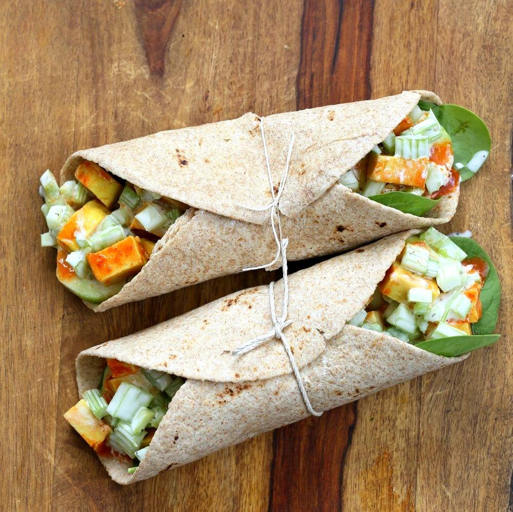 Buffalo Tofu wrap with Chickpea Tofu. Soy-free Chickpea flour Tofu tossed in buffalo hot sauce, layered with celery, spinach, cucumbers and vegan ranch. #vegan #glutenfree #soyfree #Easy weekday meal #Recipe | VeganRicha.com