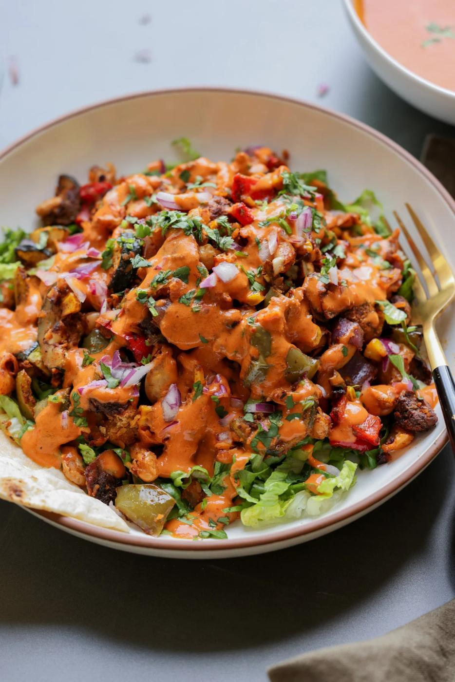 cajun sheet pan beans veggies in a bowl