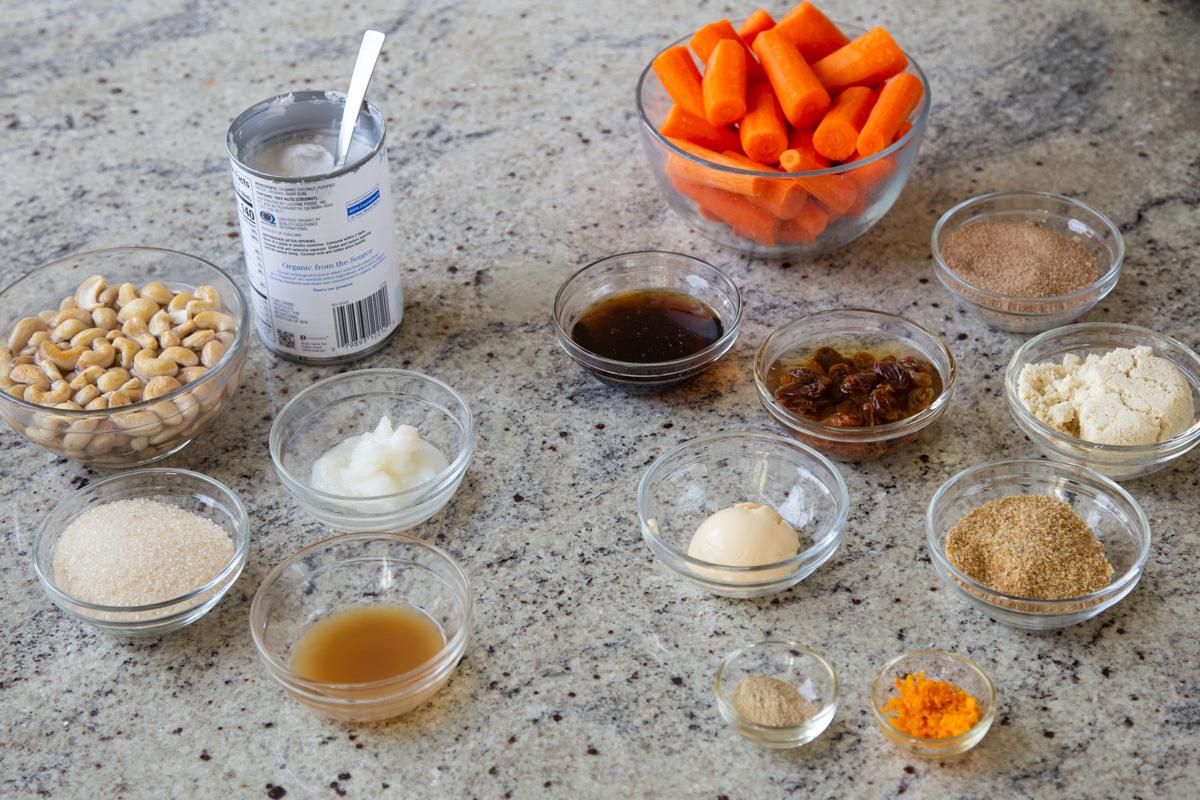 cheesecake ingredients in bowls on a kitchen counter