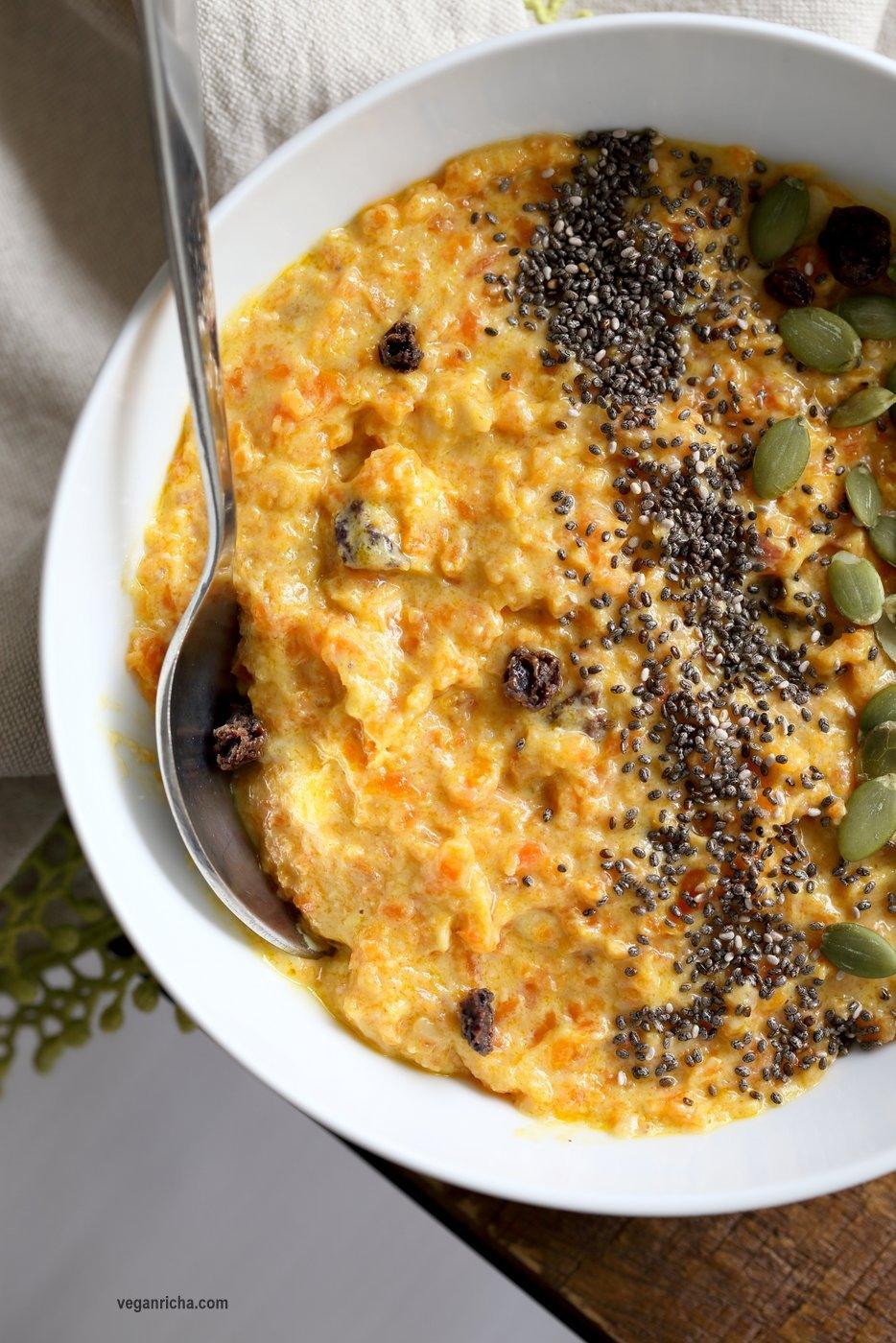 Carrot Pudding with Cardamom - Carrot Kheer Recipe. Shredded Carrots slow cooked with almond milk, roasted nuts and cardamom. Serve as is or top with toasted nuts, seeds and chia. Vegan Gluten-free Soy-free Nut-free option | VeganRicha.com
