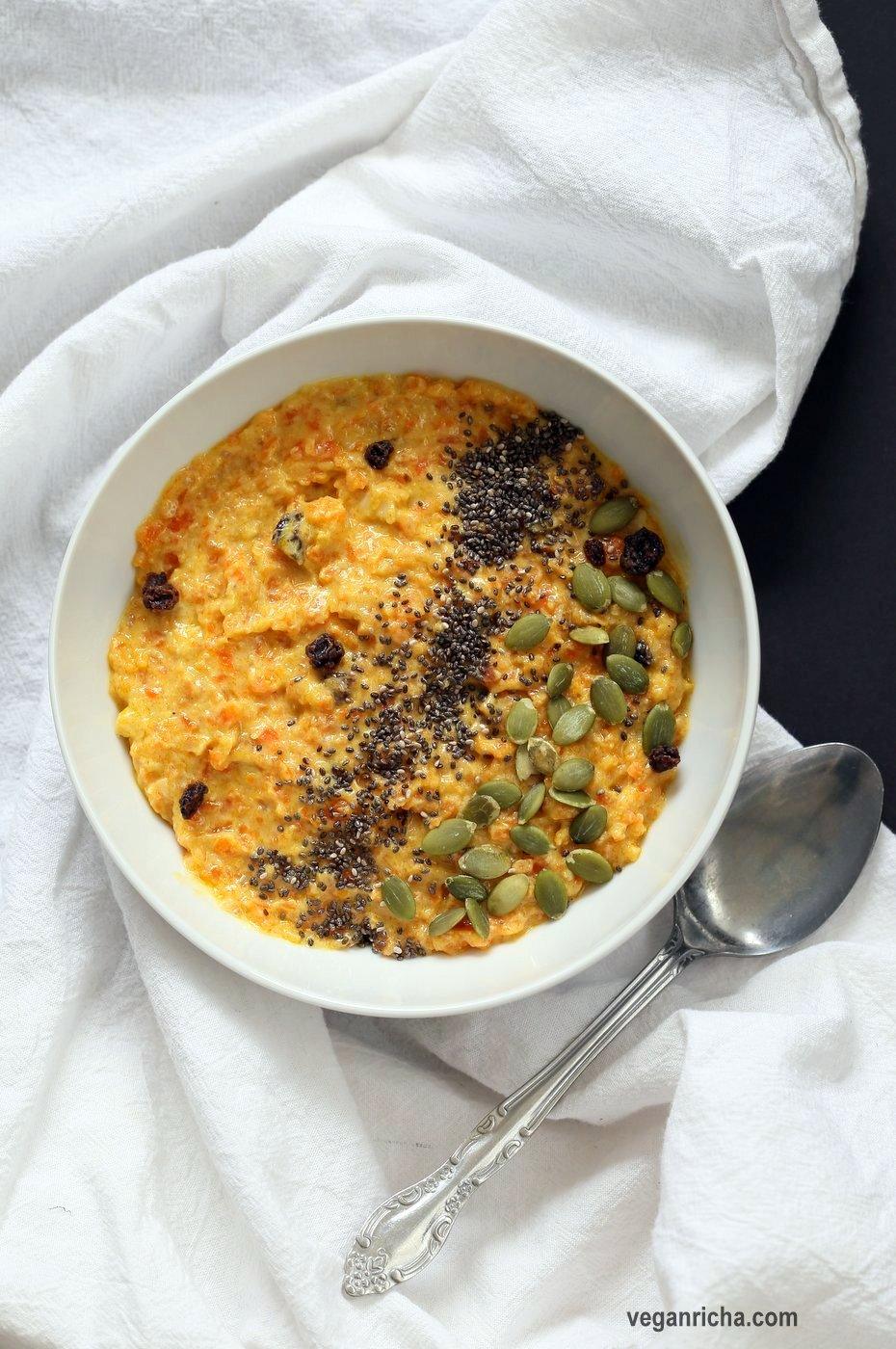 Carrot Pudding with Cardamom - Carrot Kheer Recipe. Shredded Carrots slow cooked with almond milk, roasted nuts and cardamom. Serve as is or top with toasted nuts, seeds and chia. Vegan Gluten-free Soy-free Nut-free option | VeganRicha.com