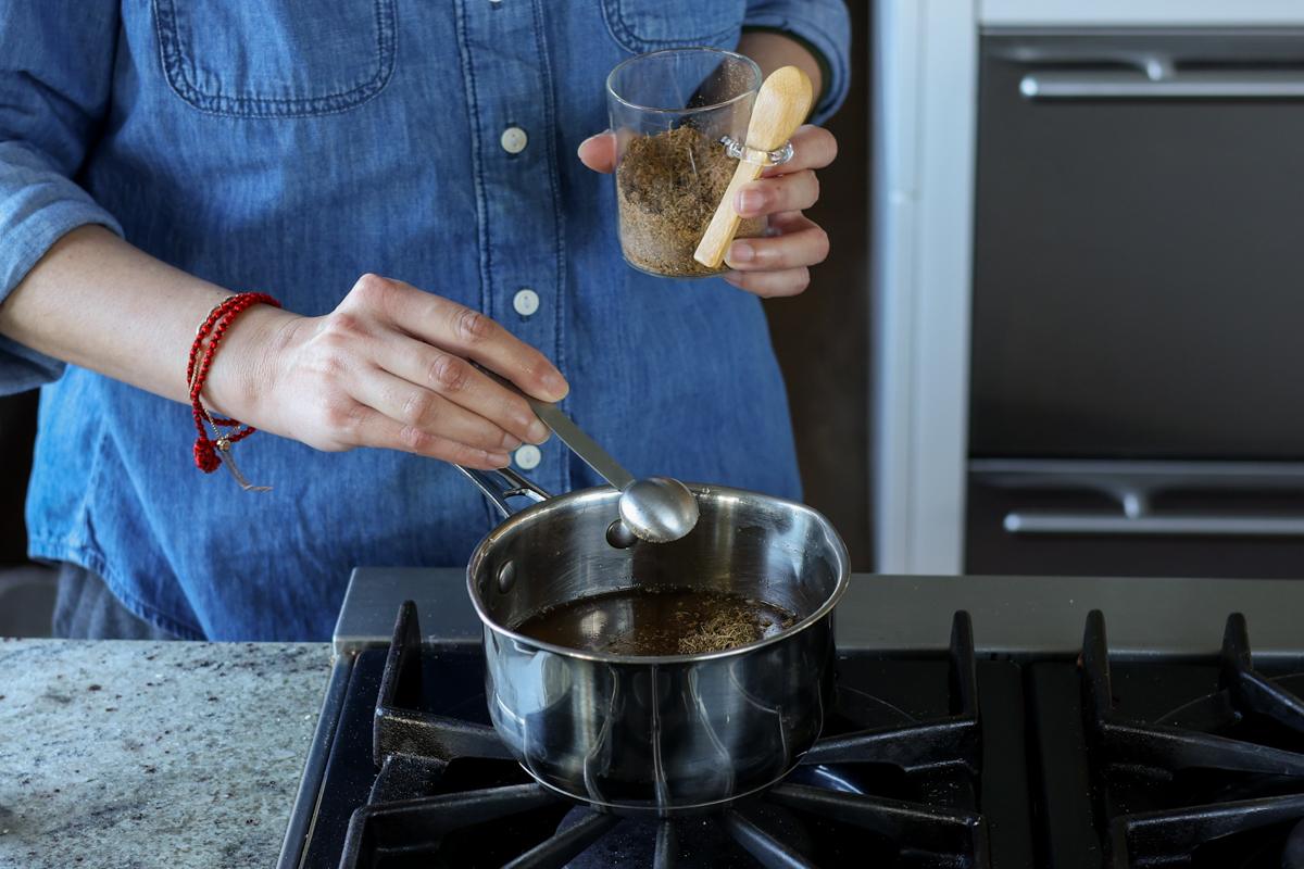 adding chai spice mix to the pan