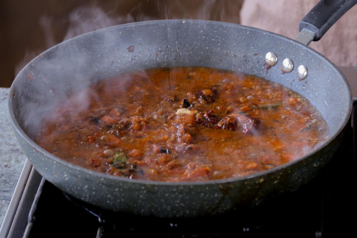 Chettinad pepper chicken sauce in the pan