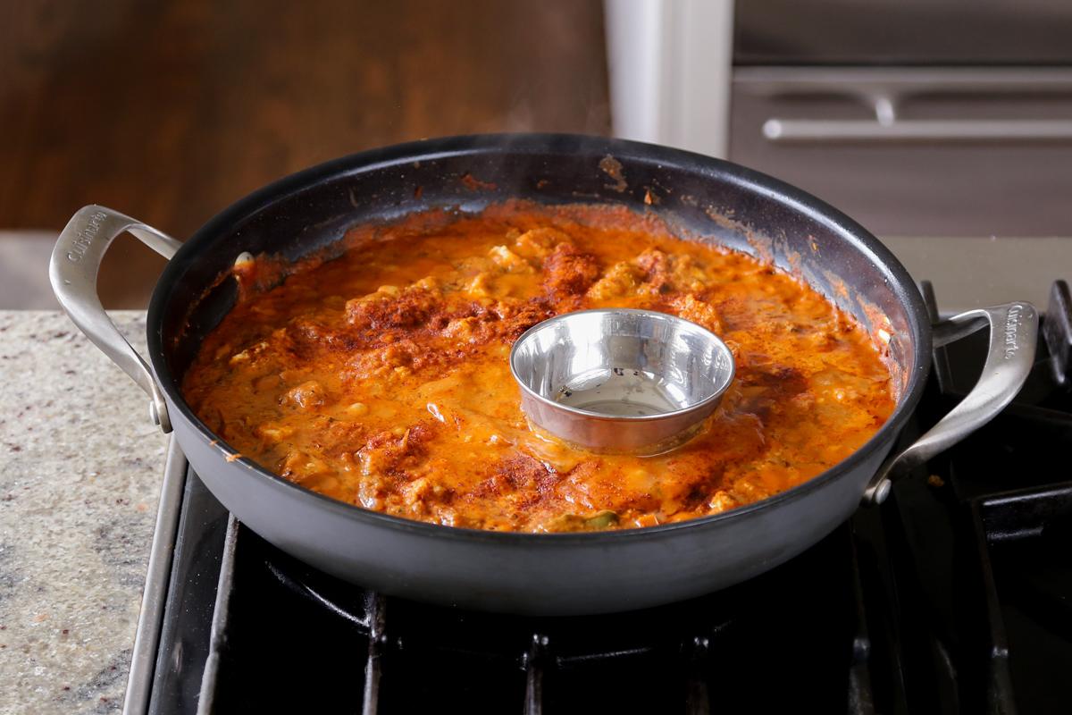 adding the ramekin to the pan