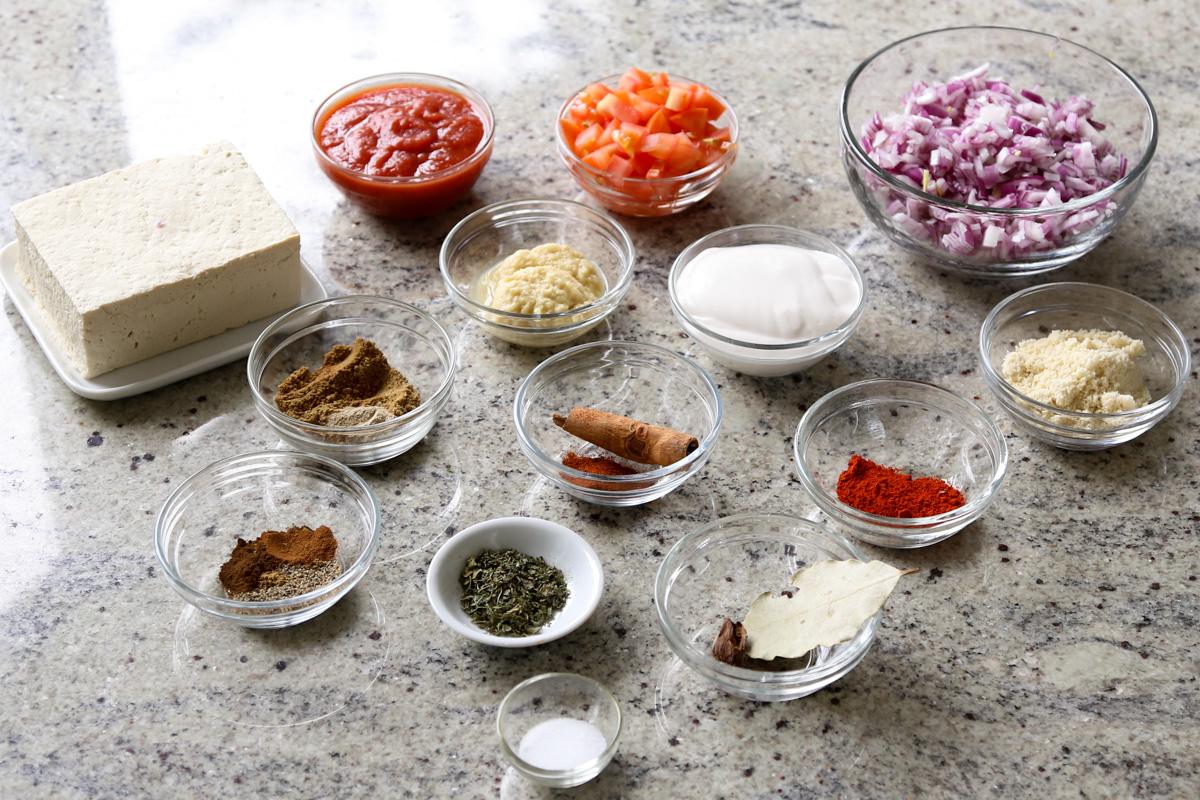 chicken angara ingredients in bowls on the kitchen counter