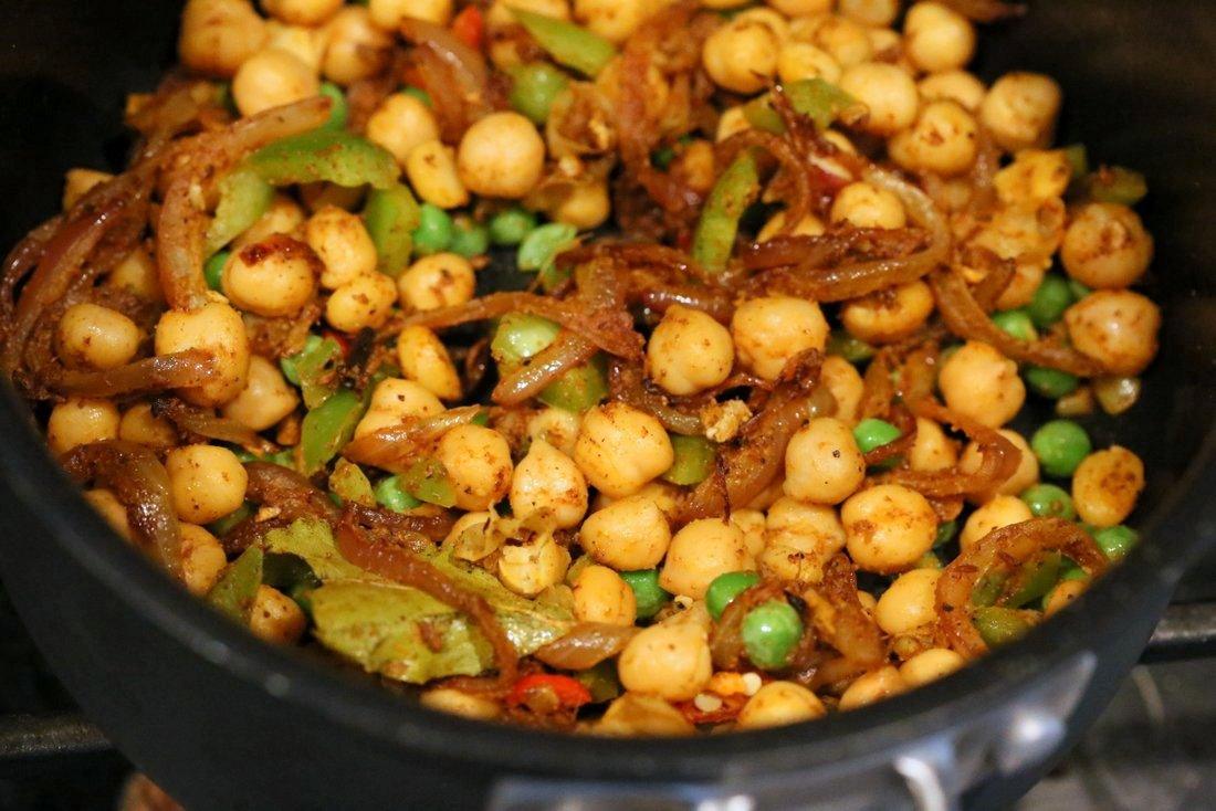 Chickpea Cauliflower Rice Biryani. 1 pot 30 Minute Meal with Veggies, Chickpeas, Spices, and Cauliflower Rice. Served with tomato raita. Vegan Gluten-free Soy-free Grain-free Recipe