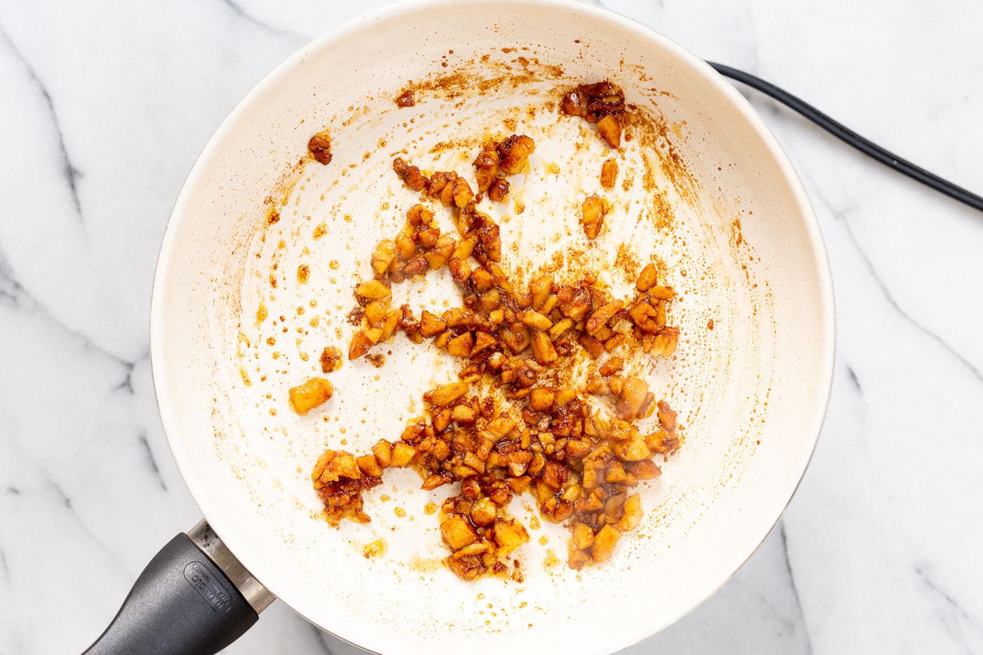 Smoky Chickpea Tofu bits on a white skillet
