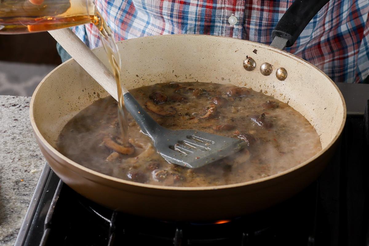 adding remaining stock to the pan