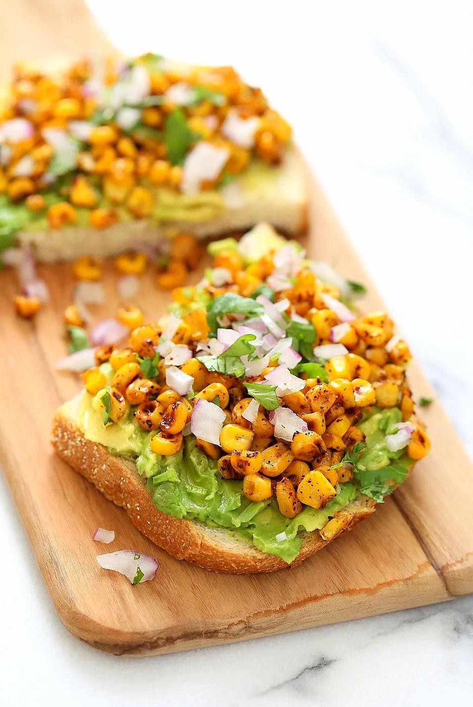 Chipotle Roasted Corn Avocado Toast. Summer corn roasted with Smoked Paprika, Chipotle and black pepper and layered over Avocado Toast. Vegan Avocado Recipe.| VeganRicha.com