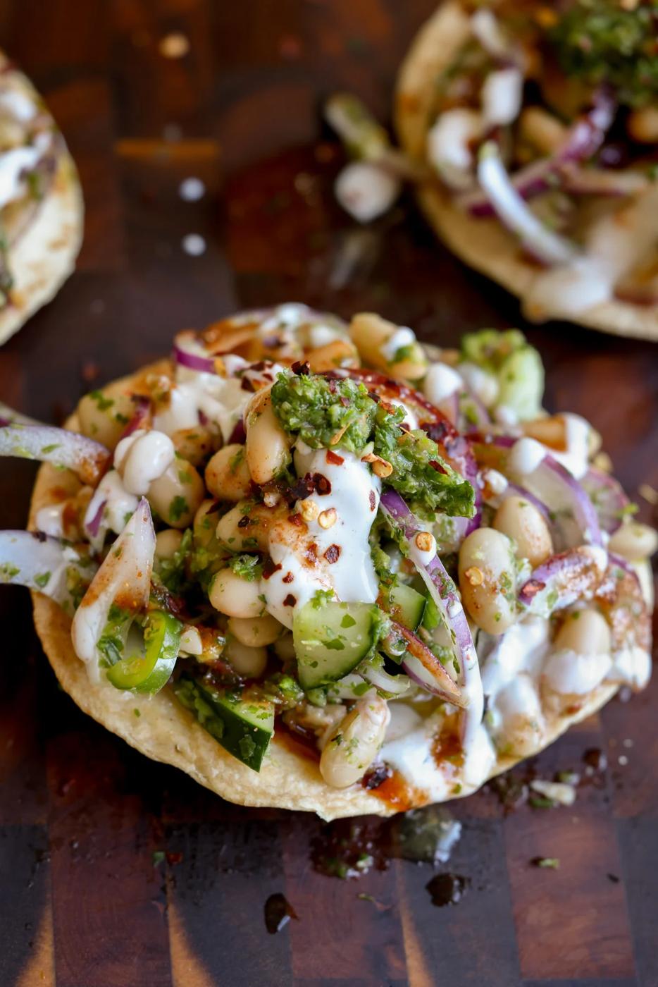 close-up of chutney bean tostadas on the cutting board