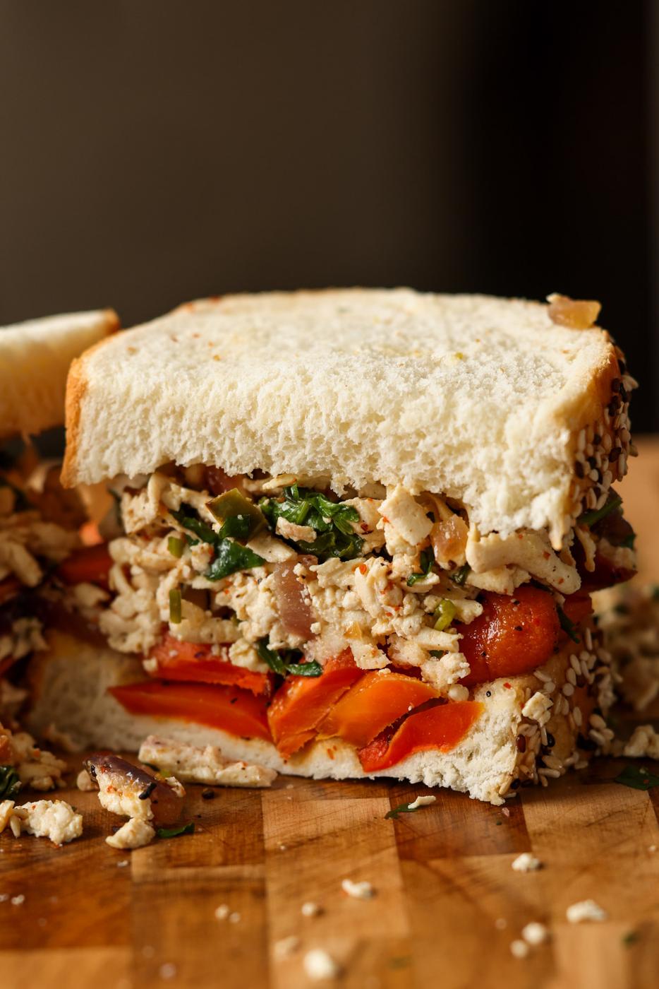 shredded tofu and roasted carrots sandwich