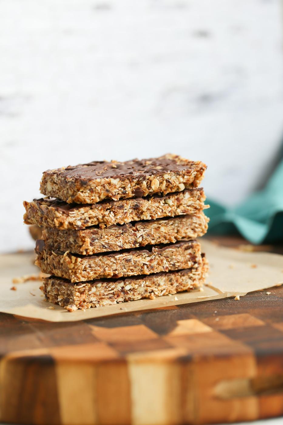 a stack of vegan coconut caramel date bars