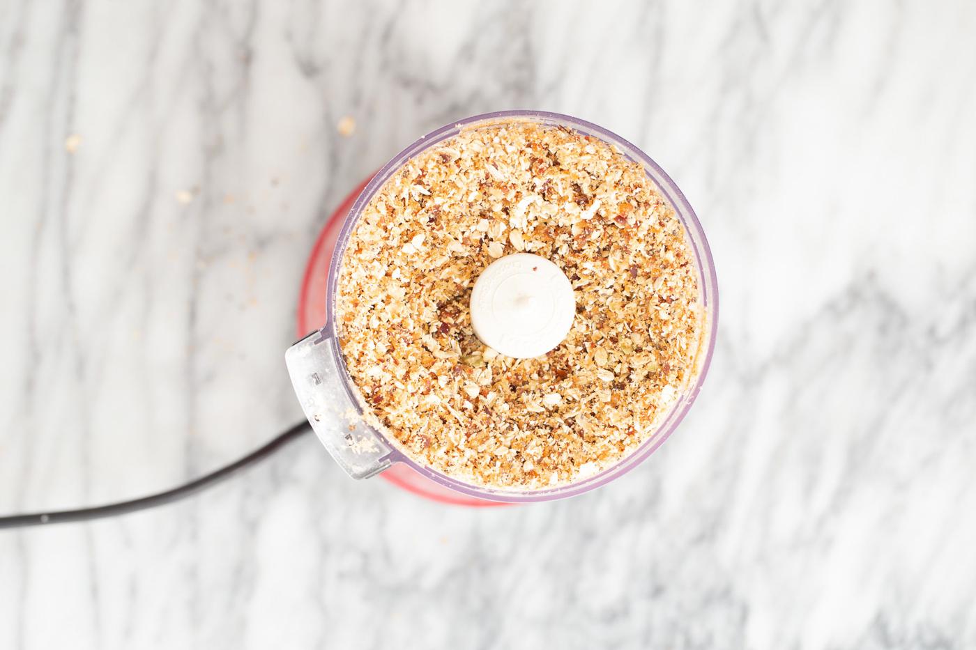 blended nuts and dates in a food processor