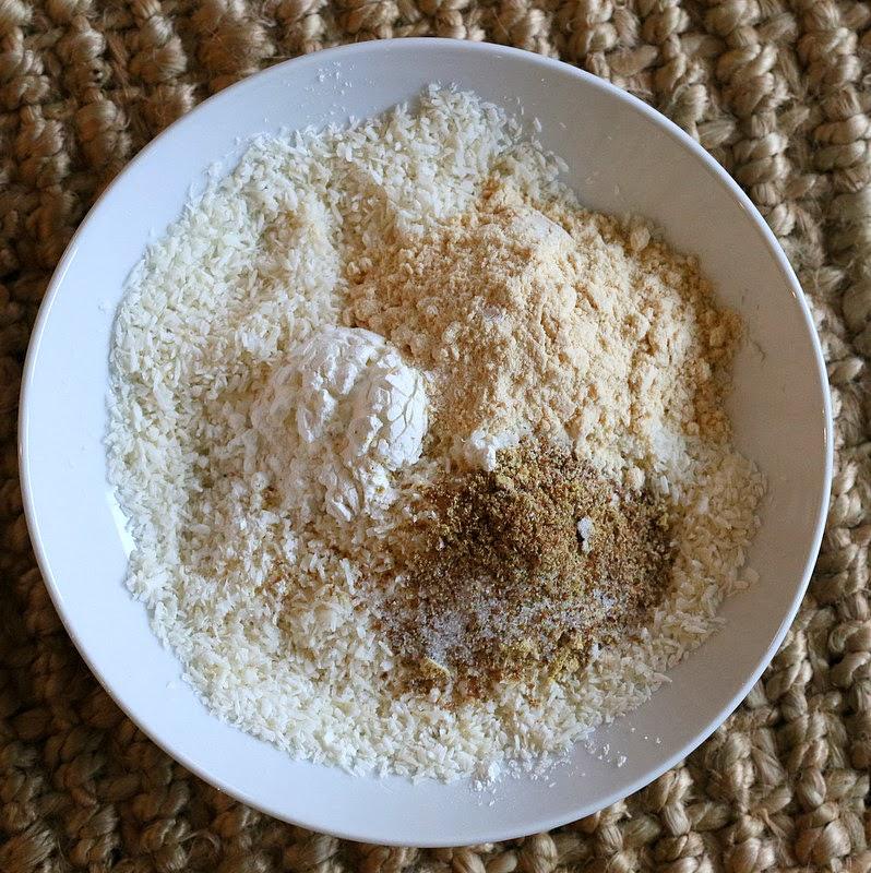 ingredients for coconut macaroons cookie mix in a white bowl