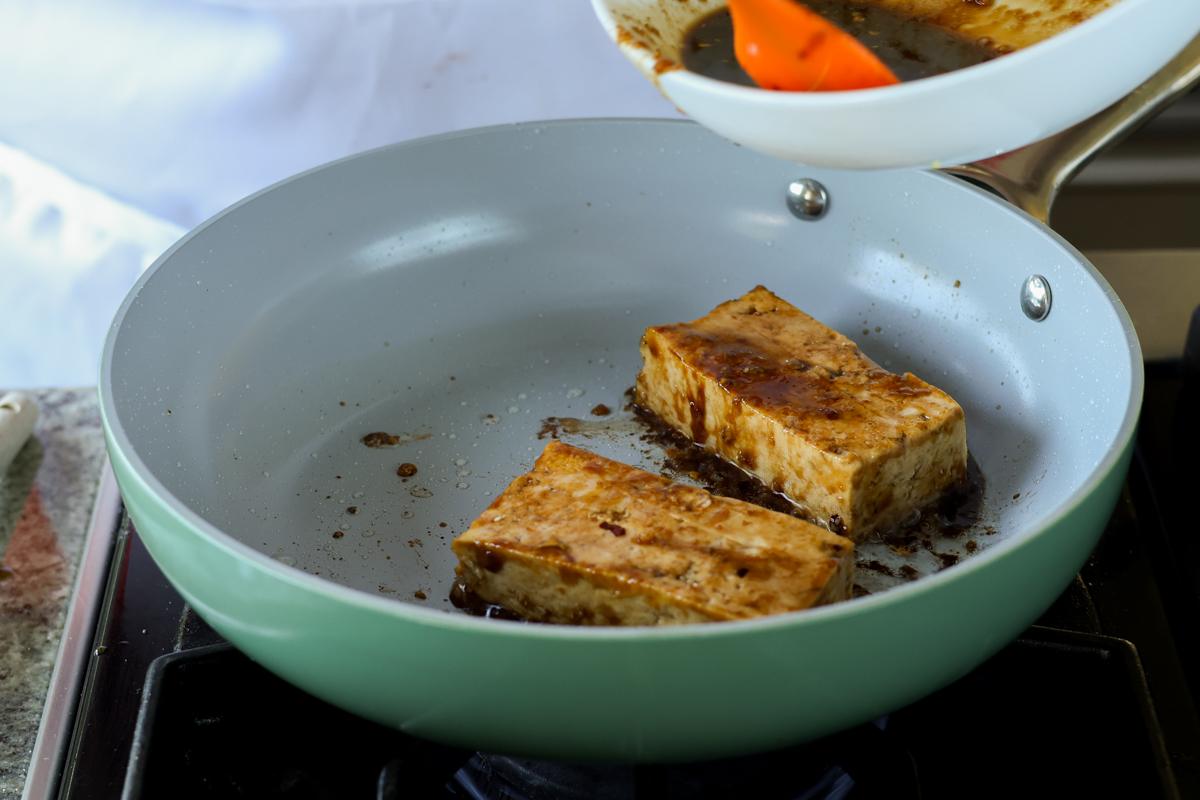 teriyaki tofu in the pan after flipping