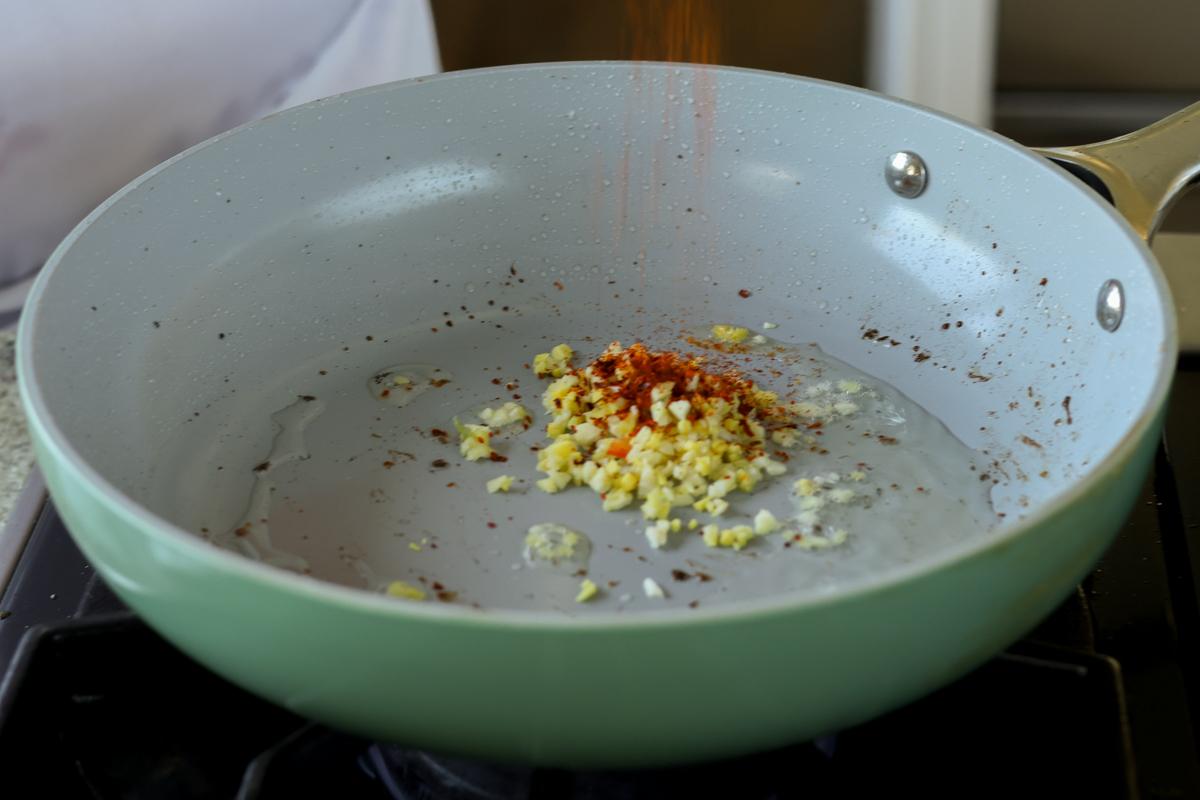 chili crisp ingredients in the pan