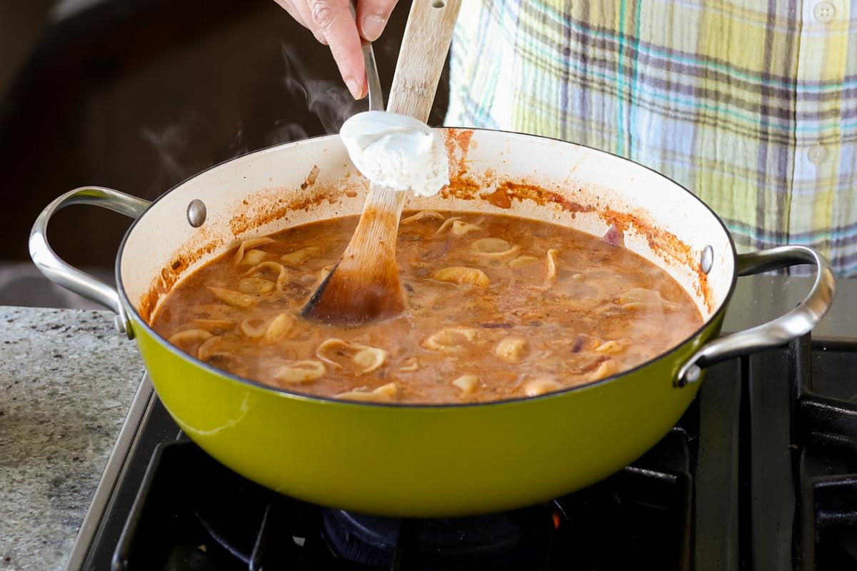 adding the cream element to the pan