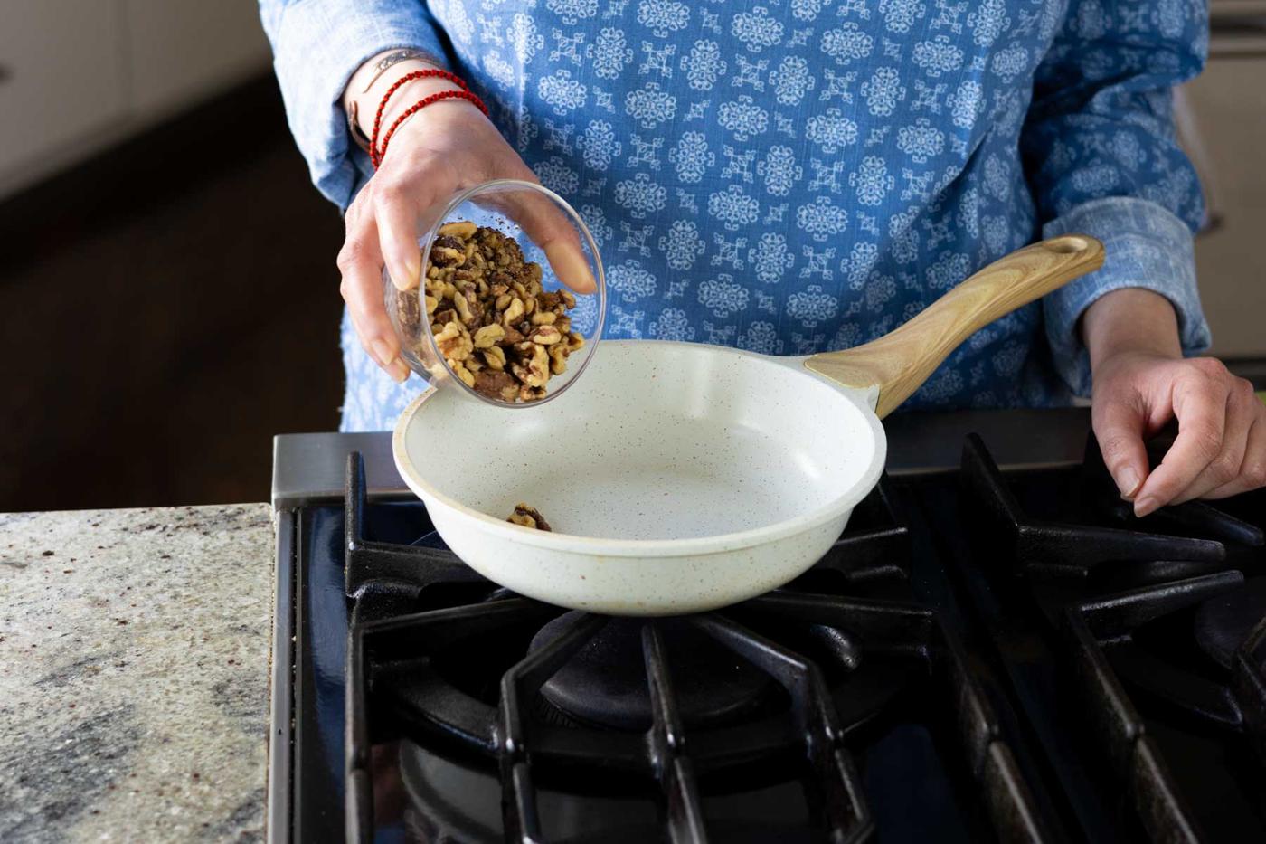 toasting the walnuts in the pan