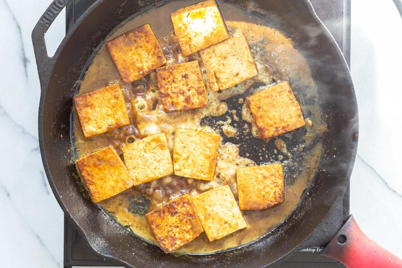 Tofu in a skillet for our Curried Tofu Banh Mi Sandwich