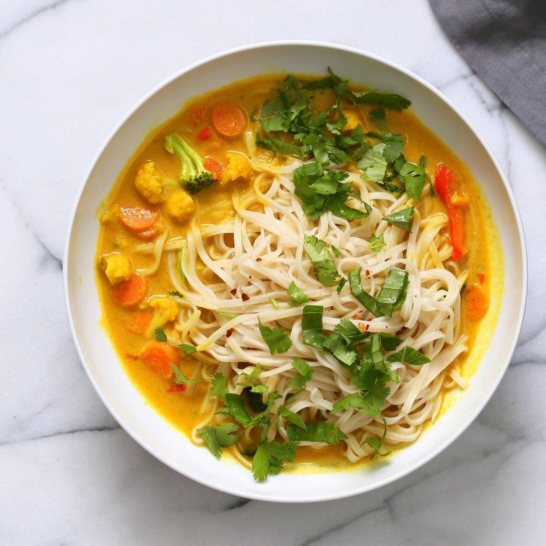 Curry Ramen with Miso Lentils Recipe. Spicy Curry flavored broth, vegetables, noodles, cilantro, basil and maple miso pepper lentils make this a must make vegan ramen. Vegan Gluten-free Soy-free Recipe | VeganRicha.com