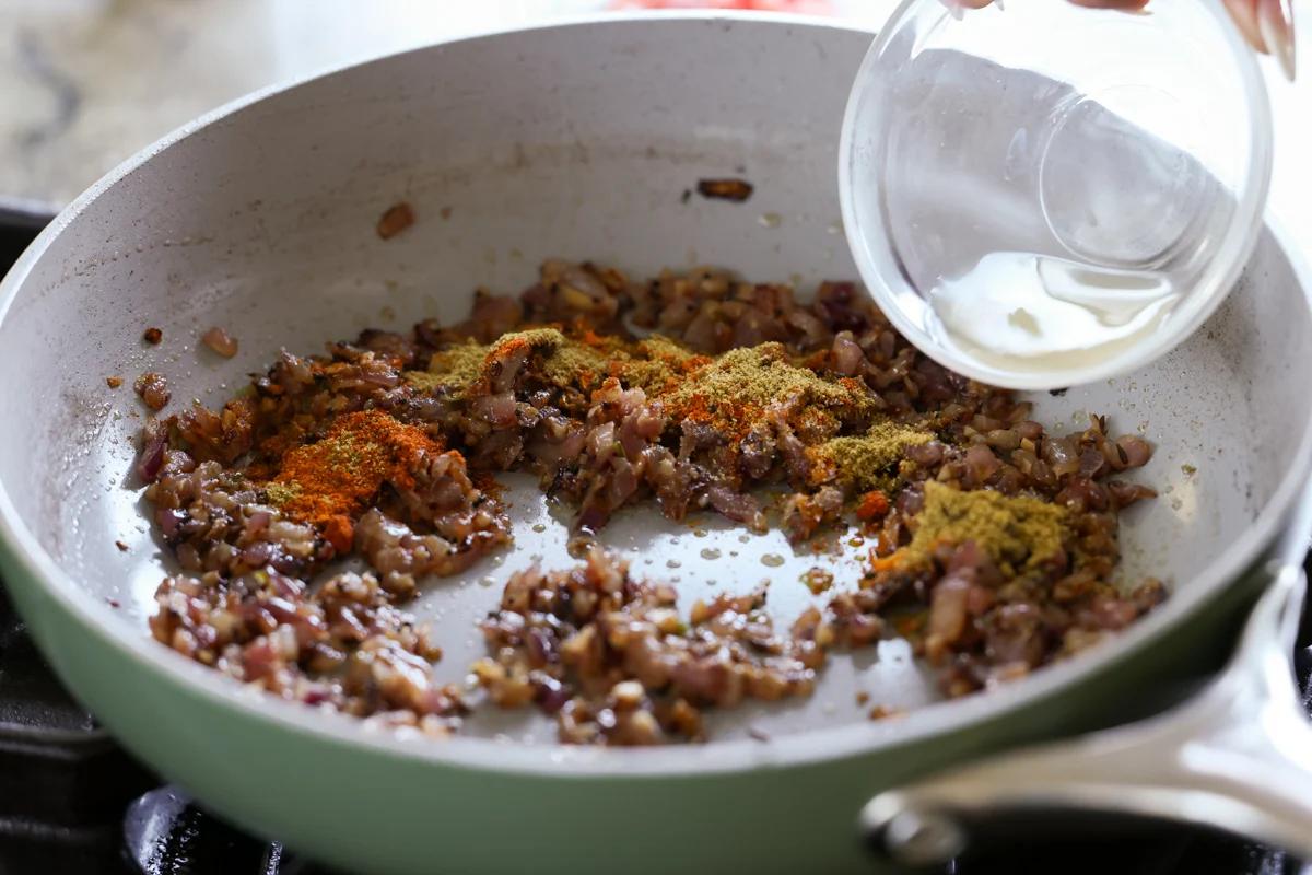 adding lemon juice to the onion mixture