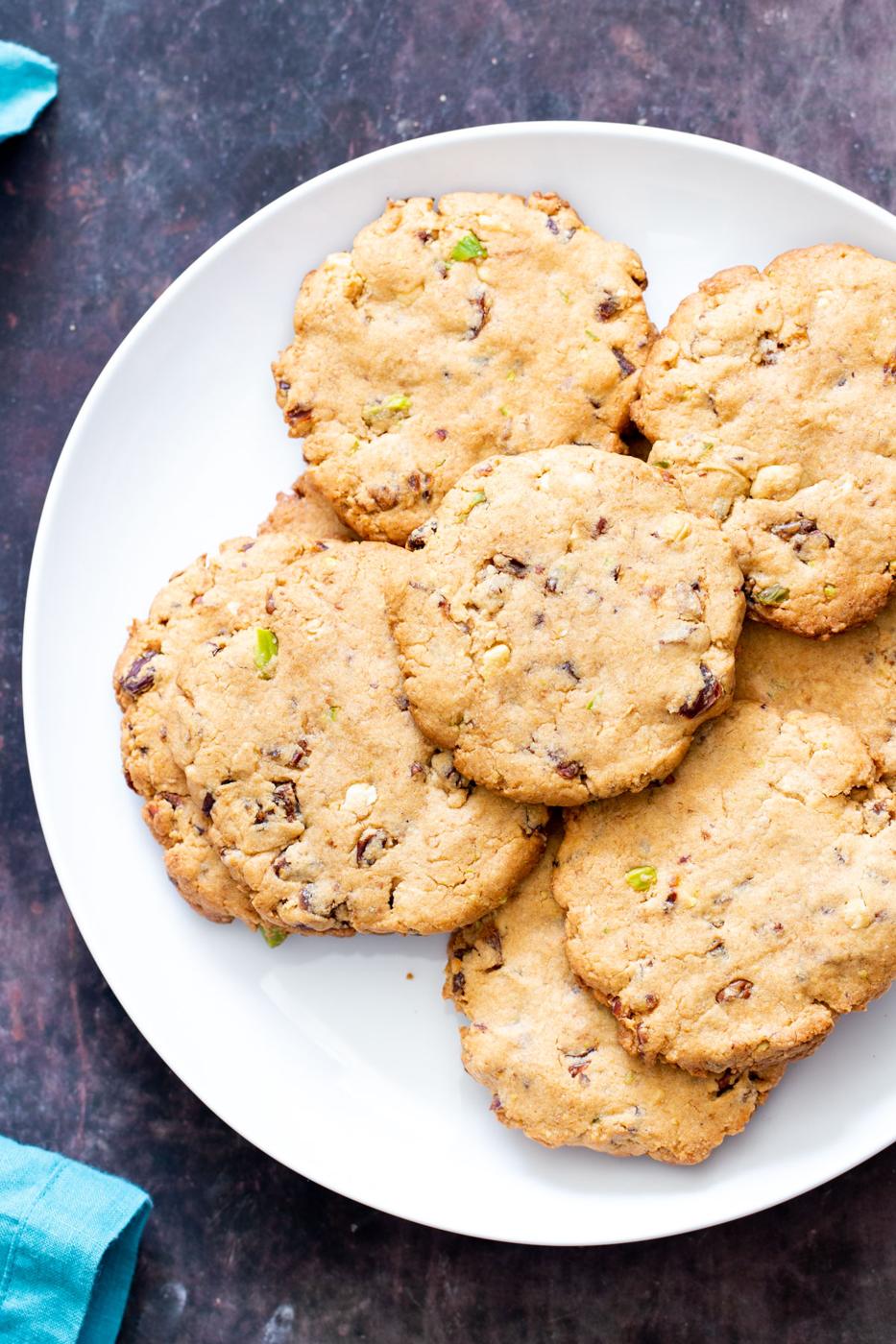 homemade vegan date nut cookies on a white plate