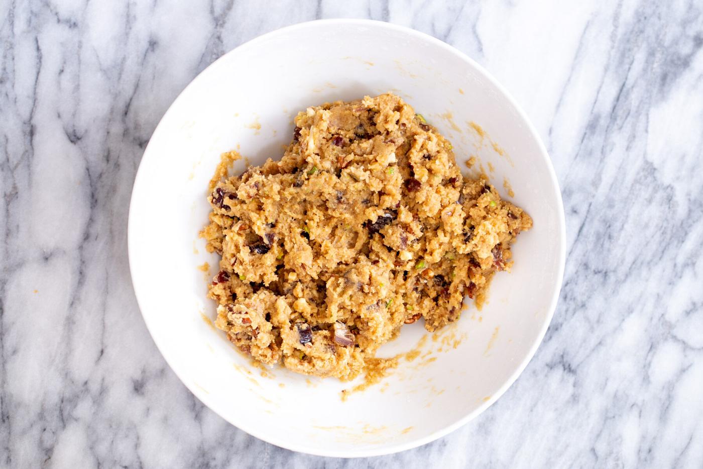 date nut cookie dough in a white bowl