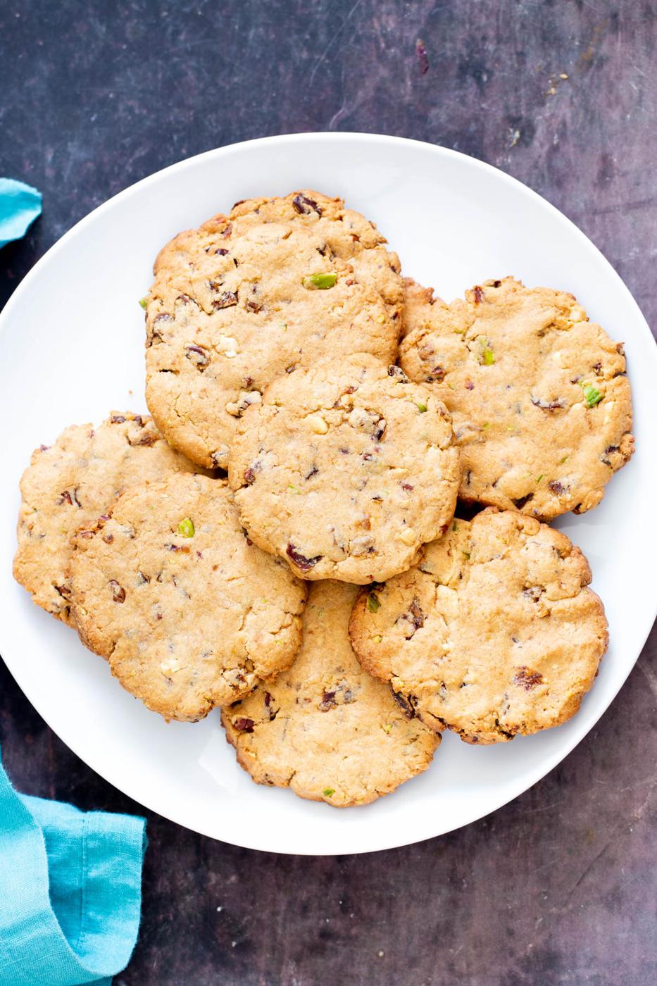 date nut cookies with nuts and dried fruit on a white plate
