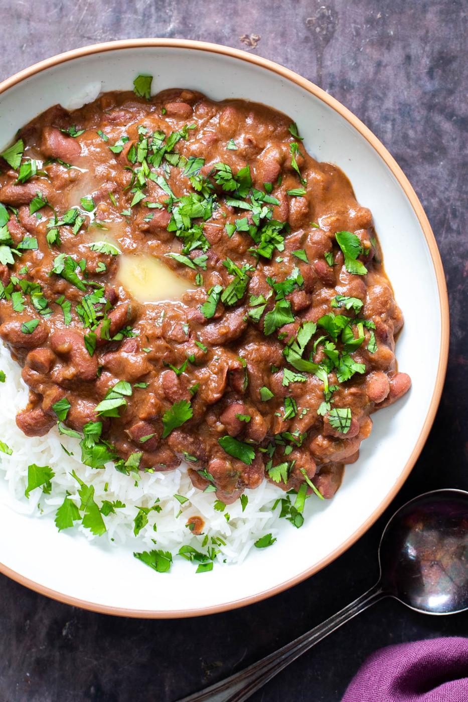 Indian Dhaba Wale Rajma served with rice sprinkled with cilantro