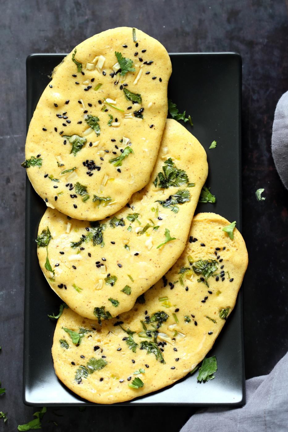 Vegan Gluten free Naan Flatbread. Grain-free Naan Recipe. 6 Main Ingredients, 1 Bowl, and 20 Minutes. Serve with curries or slice and serve with dips or add to bowls. Soyfree Nutfree options #Vegan #Glutenfree #grainfree #Veganricha #glutenfreenaan #grainfreenaan #chickpeaflournaan