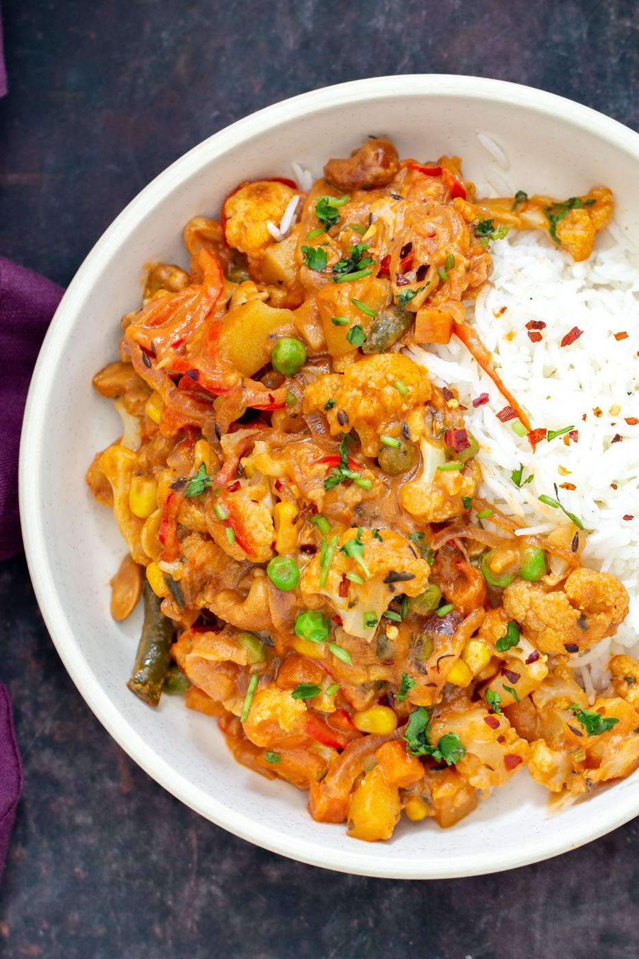 vegan diwani handi served with a side of rice